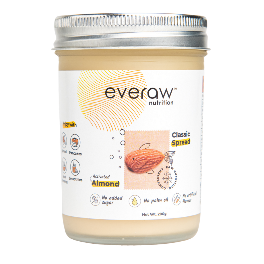 Jar of everaw nutrition almond spread on a white background