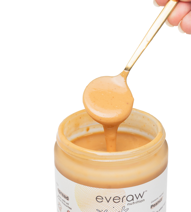 Jar of peanut butter with a spoon lifting some out, branded 'everaw nutrition'.