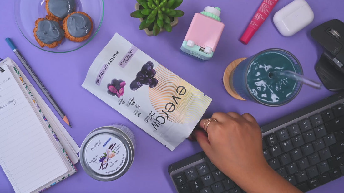 Everaw whole fruit snacks and smoothies styled on a desk and a kitchen table, the landing page hero for desktop