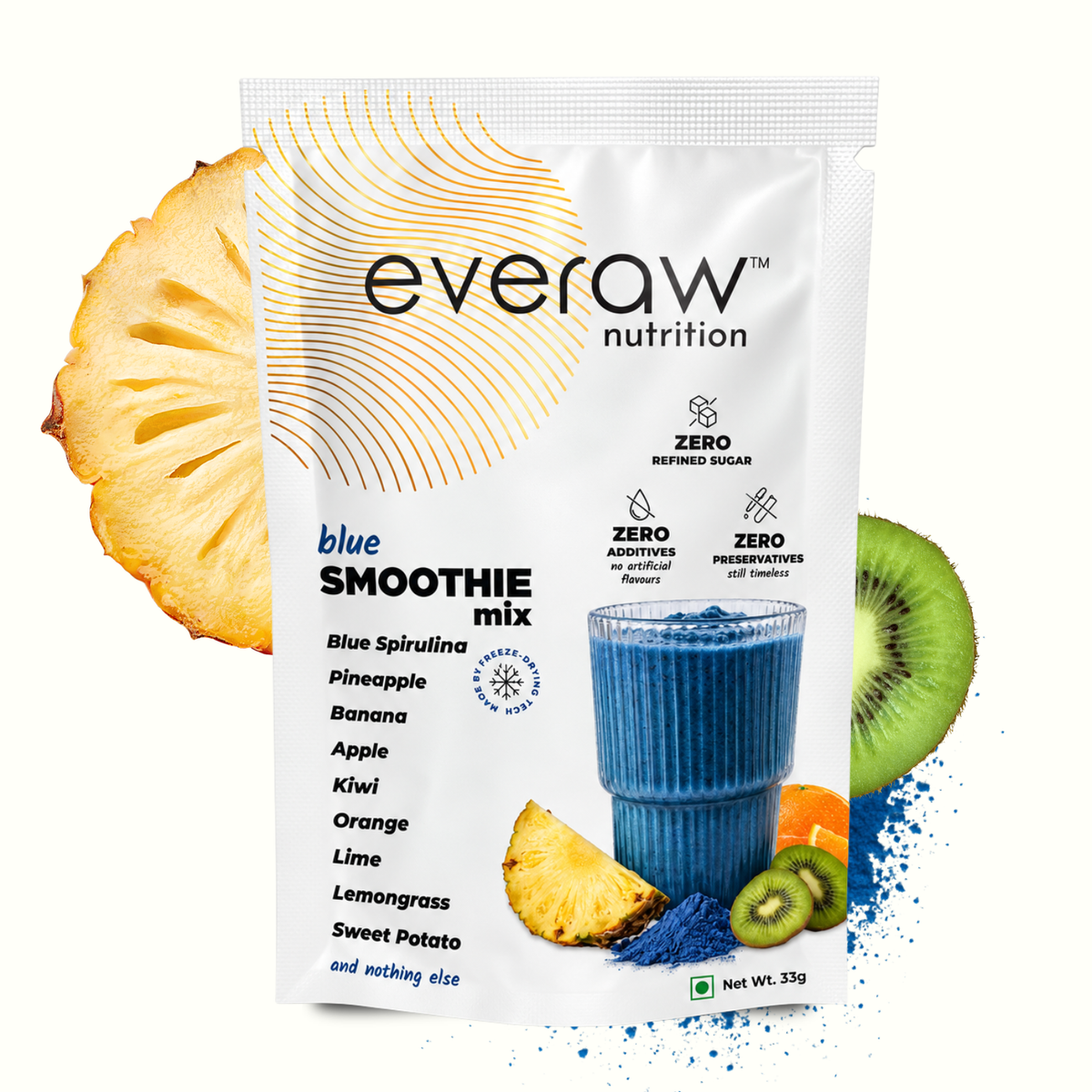 Everaw Blue Smoothie Mix 33g sachet beside a glass of blue spirulina smoothie with fresh pineapple, kiwi and orange, zero refined sugar, zero additives and zero preservatives