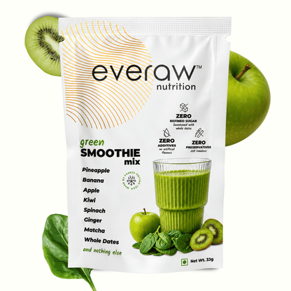 Everaw Green Smoothie Mix 33g sachet beside a glass of green smoothie with fresh green apple, kiwi and spinach, zero refined sugar, zero additives and zero preservatives