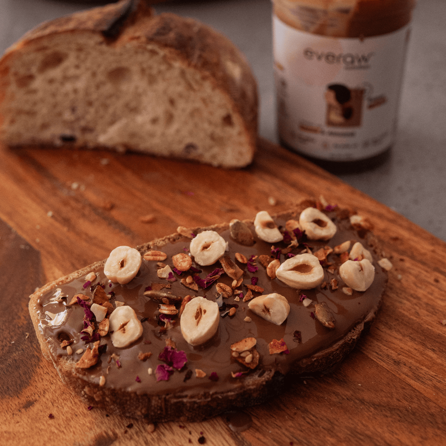 How to use Everaw Cocoa Almond Butter, spread it on toast, top your bowl or mix into smoothies and desserts, versatile real fruit and nut spread